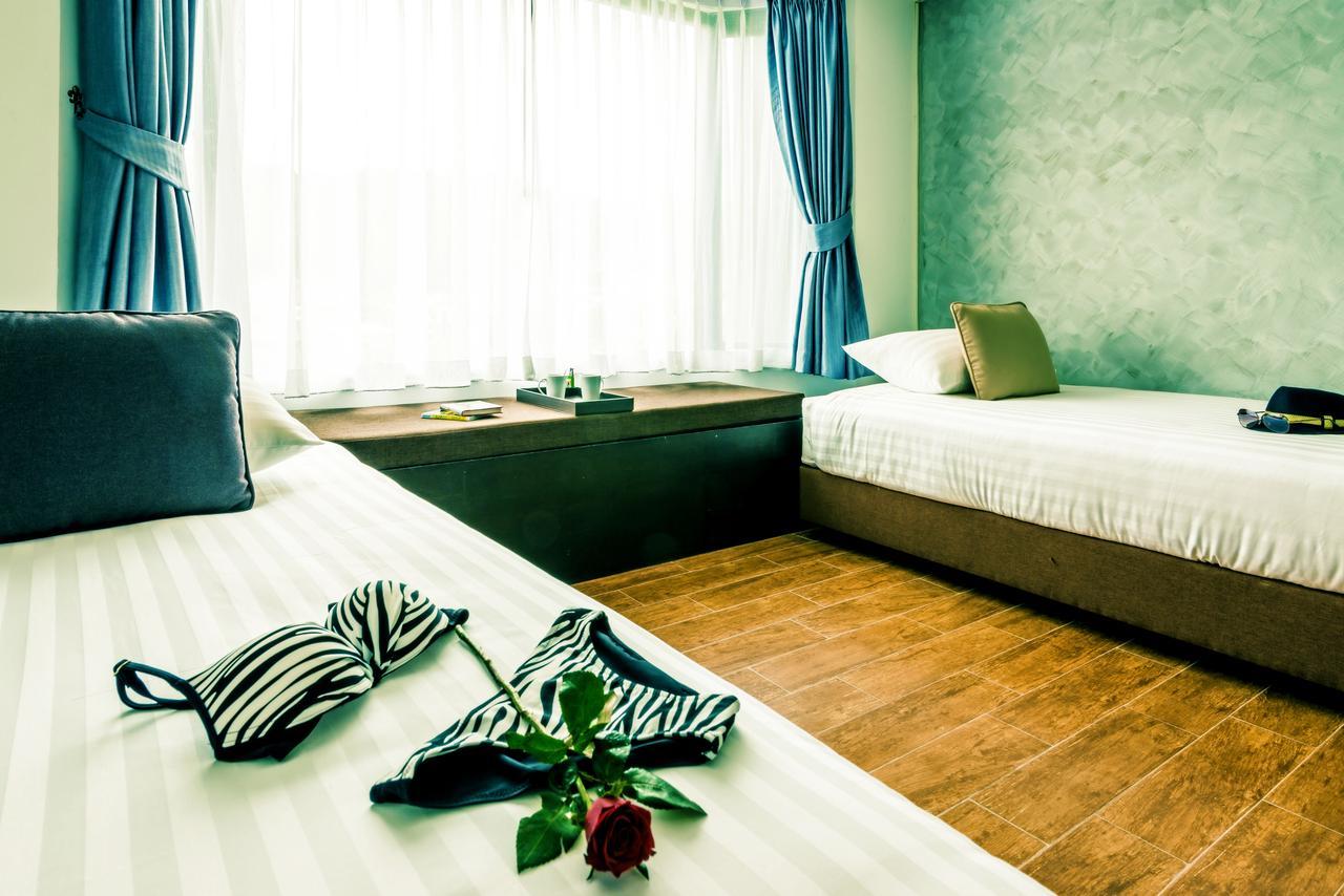 Raha Grand Hotel Patong Luaran gambar